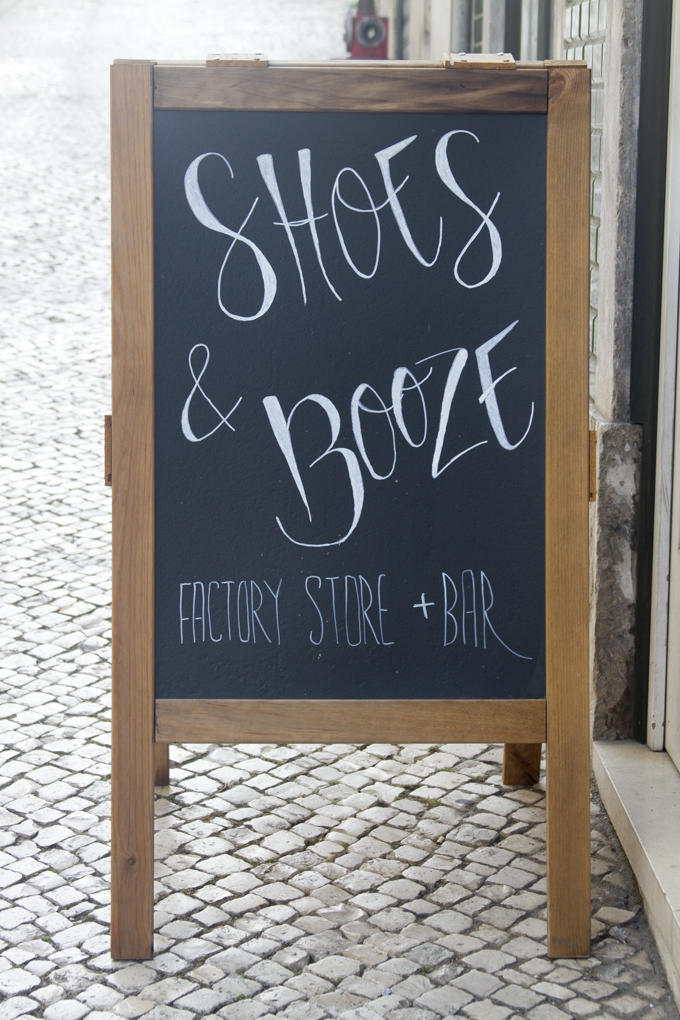 Shoes & Booze, shop sign in Lisbon, Portugal by Cattie Coyle Photography. © 2018, all rights reserved.