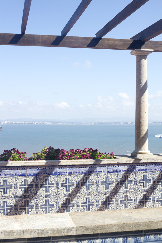 Tiles and view of the Tagus River from the Miradouro De Santa Luzia, Lisbon, Portugal, by Cattie Coyle Photography. © 2018, all rights reserved.