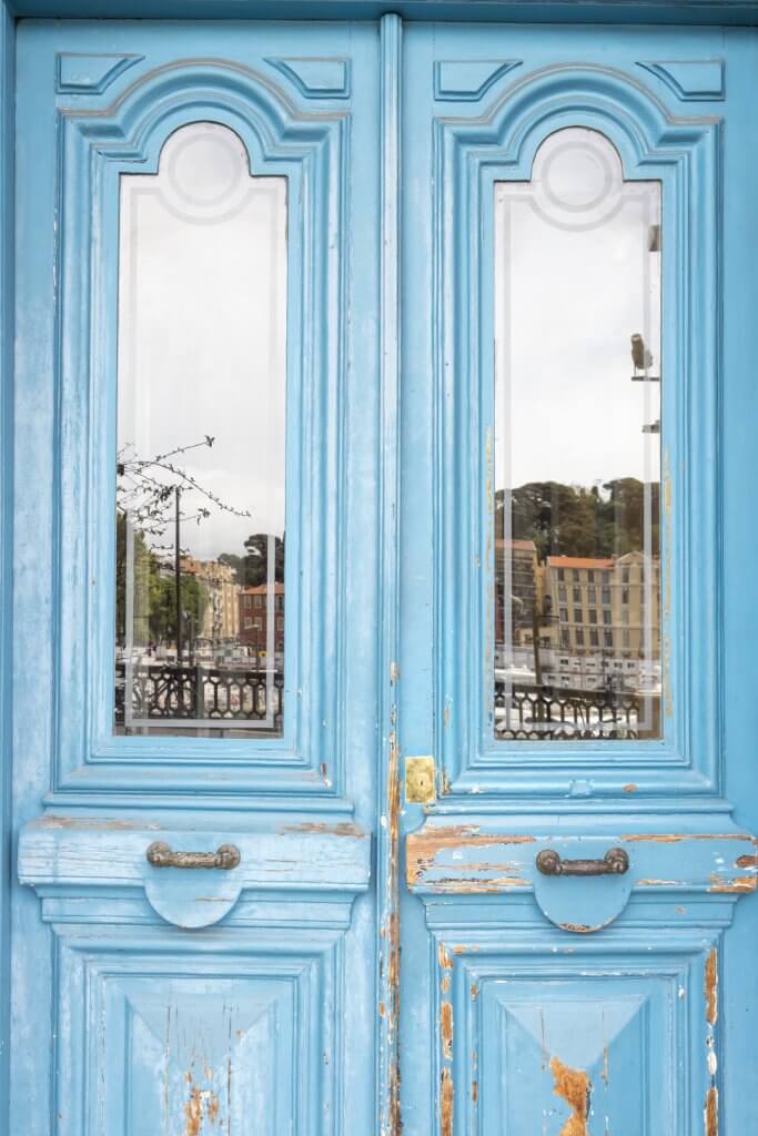 Blue doors in Port Lympia, Nice, France by Cattie Coyle Photography. © 2019, all rights reserved.