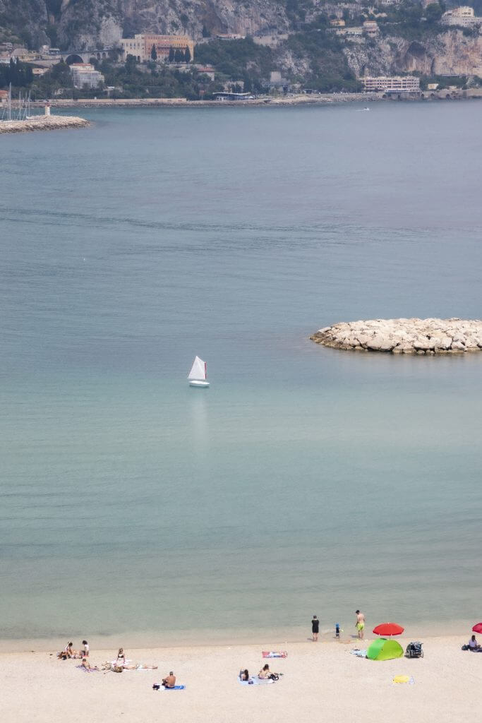 View of Plage Des Sablettes from the square outside the Basilica of Saint-Michael the Archangel, Menton by Cattie Coyle Photography