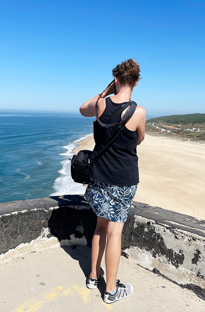 Cattie Coyle photographing in Nazare, Portugal