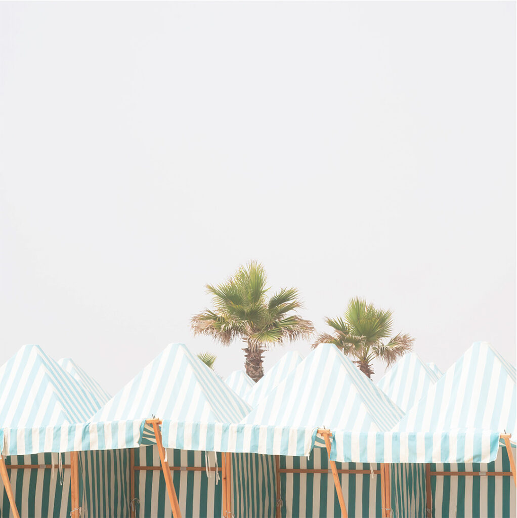 Beach cabanas and palm trees by Cattie Coyle Photography. © 2024, all rights reserved.