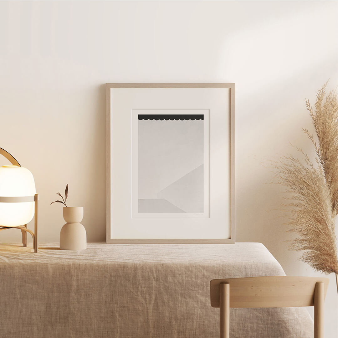 Shadow - Black and white abstract art print by Cattie Coyle Photography on table. Copyright 2018, all rights reserved.